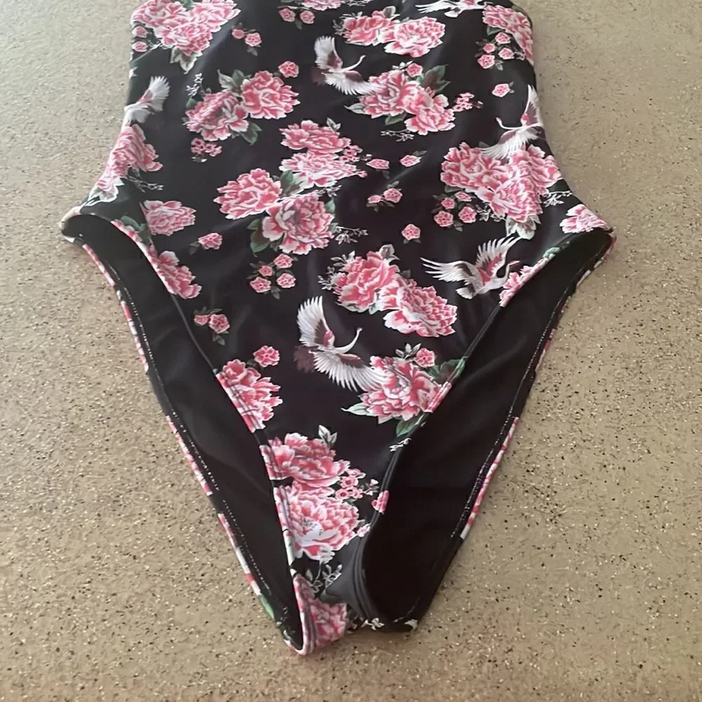 Black halter neck one piece swimsuit with roses and cranes print